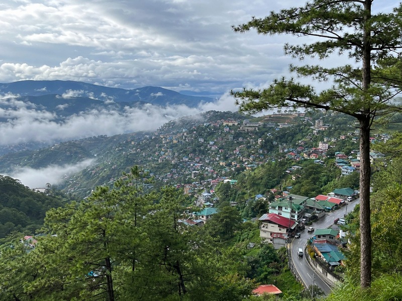 View of Baguio City nestled among pine-covered mountains